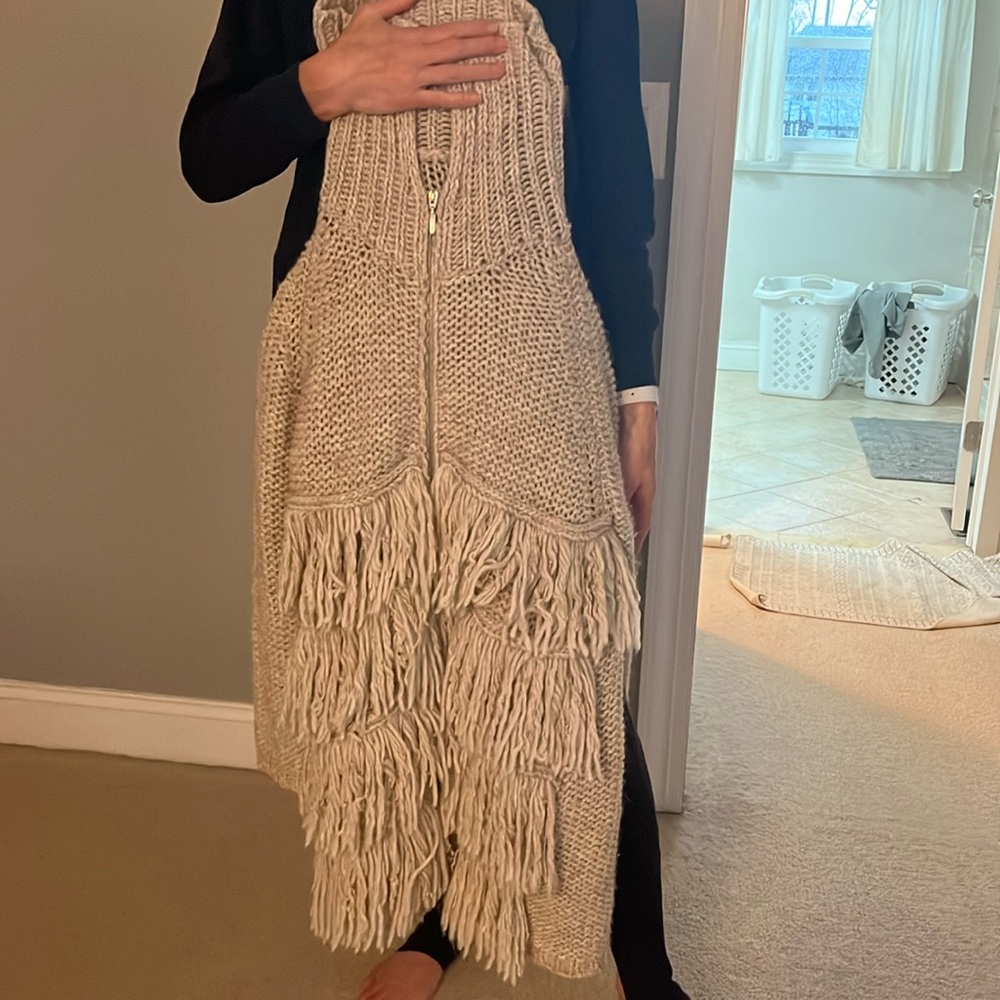 long fringed sweater